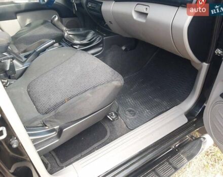 Черный Мицубиси Л 200, объемом двигателя 2.48 л и пробегом 108 тыс. км за 17500 $, фото 4 на Automoto.ua