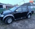 Черный Мицубиси Л 200, объемом двигателя 2.48 л и пробегом 200 тыс. км за 16500 $, фото 1 на Automoto.ua