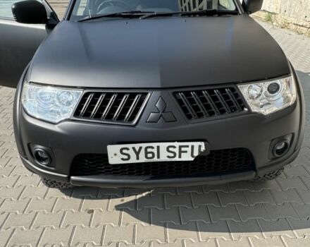 Черный Мицубиси Л 200, объемом двигателя 2.5 л и пробегом 93 тыс. км за 6600 $, фото 2 на Automoto.ua