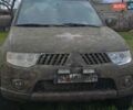 Черный Мицубиси Л 200, объемом двигателя 2.48 л и пробегом 200 тыс. км за 9200 $, фото 1 на Automoto.ua