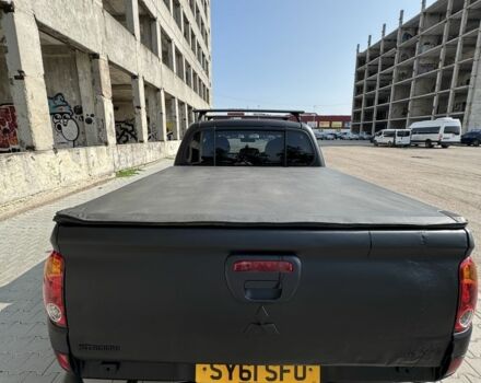 Черный Мицубиси Л 200, объемом двигателя 2.5 л и пробегом 93 тыс. км за 6600 $, фото 6 на Automoto.ua