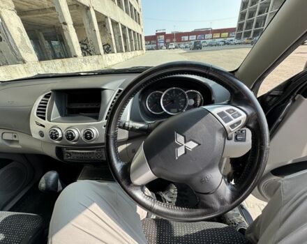Черный Мицубиси Л 200, объемом двигателя 2.5 л и пробегом 93 тыс. км за 6600 $, фото 11 на Automoto.ua