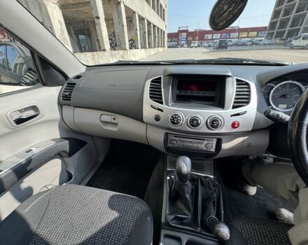 Черный Мицубиси Л 200, объемом двигателя 2.5 л и пробегом 93 тыс. км за 6600 $, фото 10 на Automoto.ua