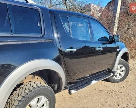 Черный Мицубиси Л 200, объемом двигателя 2.48 л и пробегом 240 тыс. км за 16000 $, фото 2 на Automoto.ua