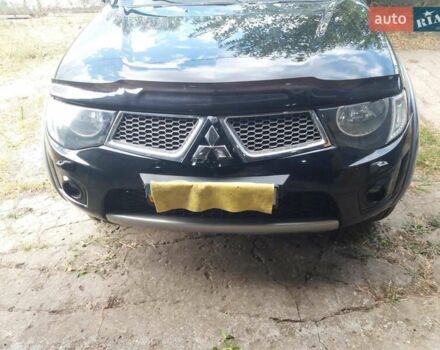 Черный Мицубиси Л 200, объемом двигателя 2.48 л и пробегом 108 тыс. км за 17500 $, фото 11 на Automoto.ua