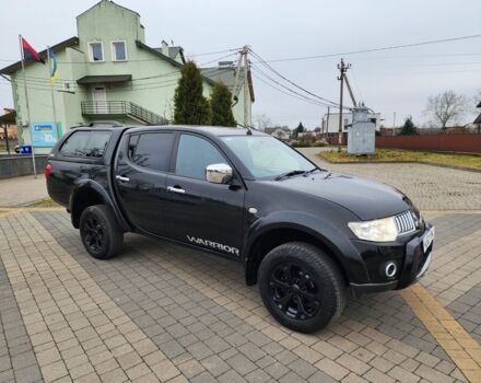 Черный Мицубиси Л 200, объемом двигателя 2.5 л и пробегом 114 тыс. км за 8748 $, фото 2 на Automoto.ua