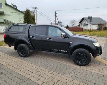 Черный Мицубиси Л 200, объемом двигателя 2.5 л и пробегом 114 тыс. км за 8748 $, фото 3 на Automoto.ua