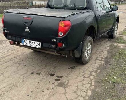 Черный Мицубиси Л 200, объемом двигателя 2.48 л и пробегом 295 тыс. км за 14800 $, фото 3 на Automoto.ua