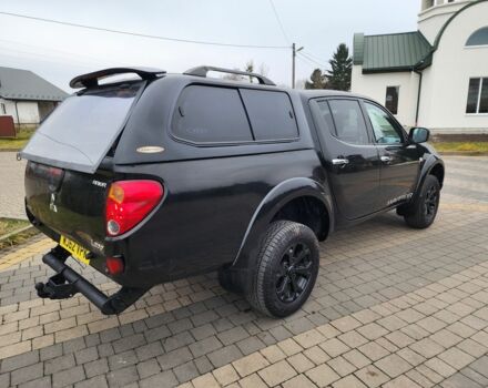 Черный Мицубиси Л 200, объемом двигателя 2.5 л и пробегом 114 тыс. км за 8748 $, фото 12 на Automoto.ua