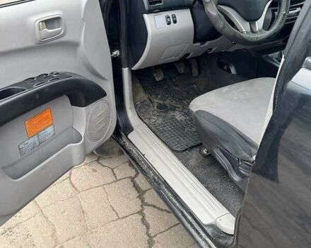 Черный Мицубиси Л 200, объемом двигателя 2.48 л и пробегом 295 тыс. км за 14800 $, фото 10 на Automoto.ua