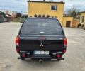 Чорний Міцубісі Л 200, об'ємом двигуна 2.5 л та пробігом 218 тис. км за 4974 $, фото 4 на Automoto.ua