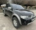 Чорний Міцубісі Л 200, об'ємом двигуна 2.5 л та пробігом 134 тис. км за 16300 $, фото 1 на Automoto.ua