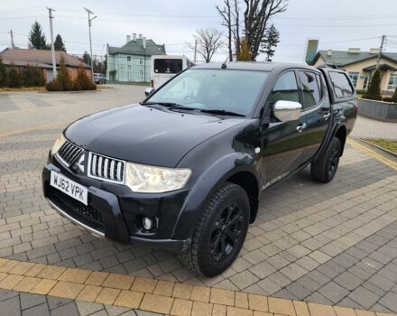 Черный Мицубиси Л 200, объемом двигателя 2.5 л и пробегом 114 тыс. км за 8748 $, фото 6 на Automoto.ua