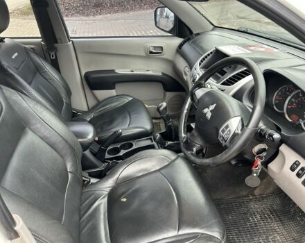 Чорний Міцубісі Л 200, об'ємом двигуна 2.5 л та пробігом 128 тис. км за 5650 $, фото 8 на Automoto.ua