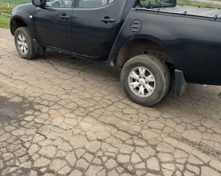 Черный Мицубиси Л 200, объемом двигателя 2.48 л и пробегом 295 тыс. км за 14800 $, фото 6 на Automoto.ua