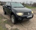 Черный Мицубиси Л 200, объемом двигателя 2.48 л и пробегом 295 тыс. км за 14800 $, фото 2 на Automoto.ua