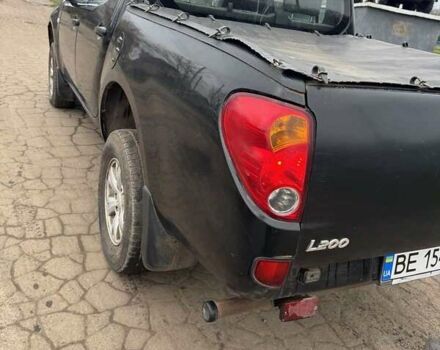 Черный Мицубиси Л 200, объемом двигателя 2.48 л и пробегом 295 тыс. км за 14800 $, фото 22 на Automoto.ua