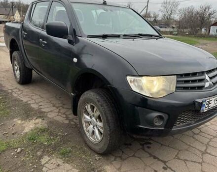 Черный Мицубиси Л 200, объемом двигателя 2.48 л и пробегом 295 тыс. км за 14800 $, фото 5 на Automoto.ua