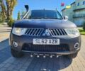 Черный Мицубиси Л 200, объемом двигателя 2.5 л и пробегом 153 тыс. км за 8831 $, фото 4 на Automoto.ua