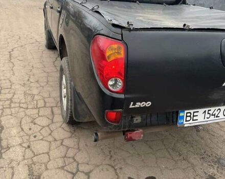Черный Мицубиси Л 200, объемом двигателя 2.48 л и пробегом 295 тыс. км за 14800 $, фото 8 на Automoto.ua
