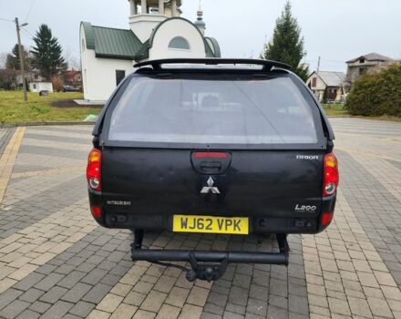 Черный Мицубиси Л 200, объемом двигателя 2.5 л и пробегом 114 тыс. км за 8748 $, фото 10 на Automoto.ua