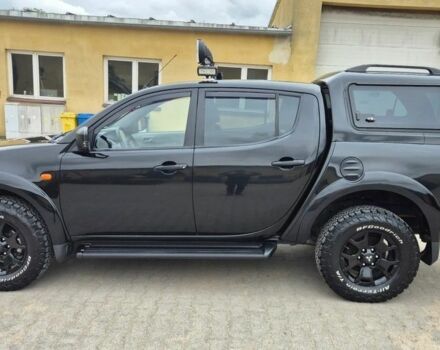 Чорний Міцубісі Л 200, об'ємом двигуна 2.5 л та пробігом 218 тис. км за 4974 $, фото 1 на Automoto.ua