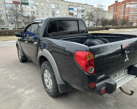 Чорний Міцубісі Л 200, об'ємом двигуна 2.5 л та пробігом 134 тис. км за 16300 $, фото 3 на Automoto.ua