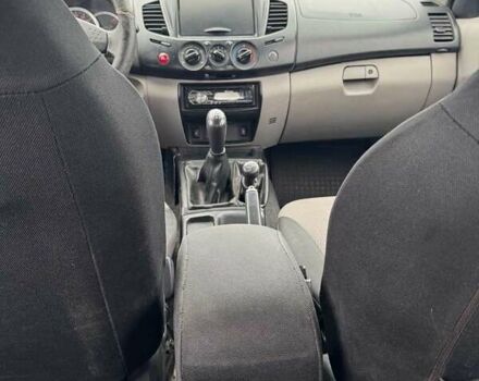 Черный Мицубиси Л 200, объемом двигателя 2.48 л и пробегом 295 тыс. км за 14800 $, фото 16 на Automoto.ua