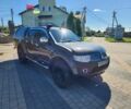 Черный Мицубиси Л 200, объемом двигателя 2.5 л и пробегом 153 тыс. км за 8831 $, фото 1 на Automoto.ua