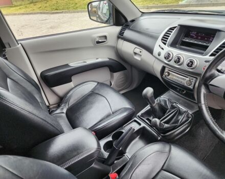 Черный Мицубиси Л 200, объемом двигателя 2.5 л и пробегом 114 тыс. км за 8748 $, фото 16 на Automoto.ua