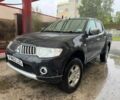 Чорний Міцубісі Л 200, об'ємом двигуна 2.5 л та пробігом 163 тис. км за 7800 $, фото 1 на Automoto.ua