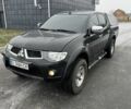 Черный Мицубиси Л 200, объемом двигателя 2.5 л и пробегом 270 тыс. км за 16500 $, фото 1 на Automoto.ua