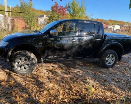 Черный Мицубиси Л 200, объемом двигателя 2.5 л и пробегом 163 тыс. км за 7600 $, фото 3 на Automoto.ua