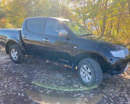 Черный Мицубиси Л 200, объемом двигателя 2.5 л и пробегом 163 тыс. км за 7600 $, фото 2 на Automoto.ua