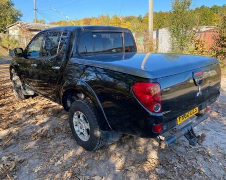 Черный Мицубиси Л 200, объемом двигателя 2.5 л и пробегом 163 тыс. км за 7600 $, фото 4 на Automoto.ua