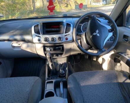 Черный Мицубиси Л 200, объемом двигателя 2.5 л и пробегом 163 тыс. км за 7600 $, фото 9 на Automoto.ua