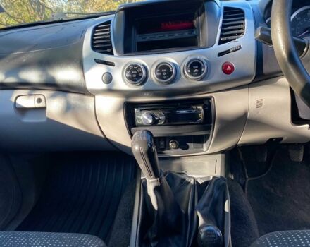 Черный Мицубиси Л 200, объемом двигателя 2.5 л и пробегом 163 тыс. км за 7600 $, фото 17 на Automoto.ua