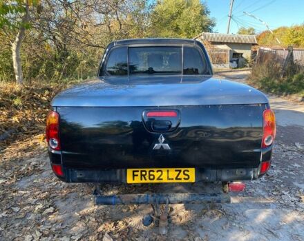 Черный Мицубиси Л 200, объемом двигателя 2.5 л и пробегом 163 тыс. км за 7600 $, фото 6 на Automoto.ua