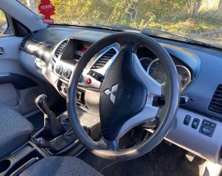 Черный Мицубиси Л 200, объемом двигателя 2.5 л и пробегом 163 тыс. км за 7600 $, фото 10 на Automoto.ua