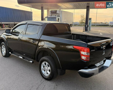 Чорний Міцубісі Л 200, об'ємом двигуна 2.44 л та пробігом 190 тис. км за 19900 $, фото 9 на Automoto.ua