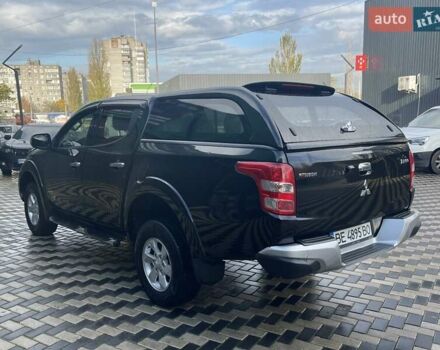 Чорний Міцубісі Л 200, об'ємом двигуна 2.4 л та пробігом 205 тис. км за 20900 $, фото 5 на Automoto.ua
