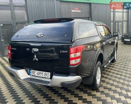 Чорний Міцубісі Л 200, об'ємом двигуна 2.4 л та пробігом 205 тис. км за 20900 $, фото 7 на Automoto.ua