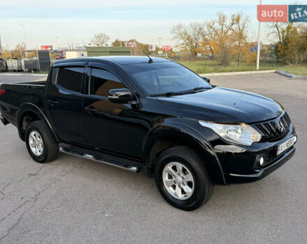 Чорний Міцубісі Л 200, об'ємом двигуна 2.44 л та пробігом 190 тис. км за 19900 $, фото 7 на Automoto.ua