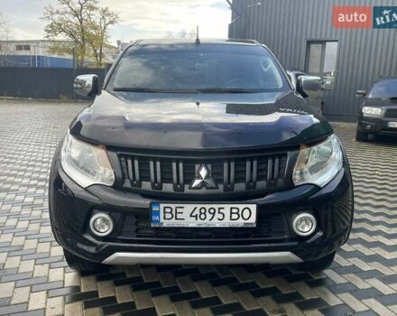 Чорний Міцубісі Л 200, об'ємом двигуна 2.4 л та пробігом 205 тис. км за 20900 $, фото 1 на Automoto.ua