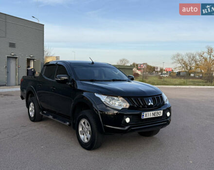 Чорний Міцубісі Л 200, об'ємом двигуна 2.44 л та пробігом 190 тис. км за 19900 $, фото 2 на Automoto.ua