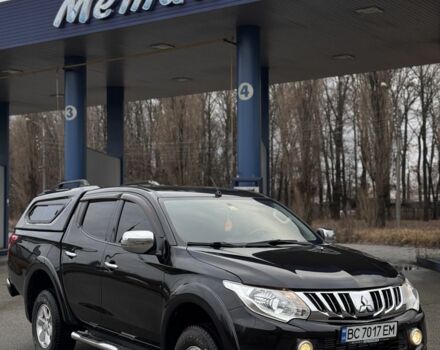 Черный Мицубиси Л 200, объемом двигателя 2.4 л и пробегом 186 тыс. км за 22200 $, фото 6 на Automoto.ua