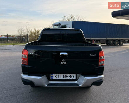 Чорний Міцубісі Л 200, об'ємом двигуна 2.44 л та пробігом 190 тис. км за 19900 $, фото 10 на Automoto.ua