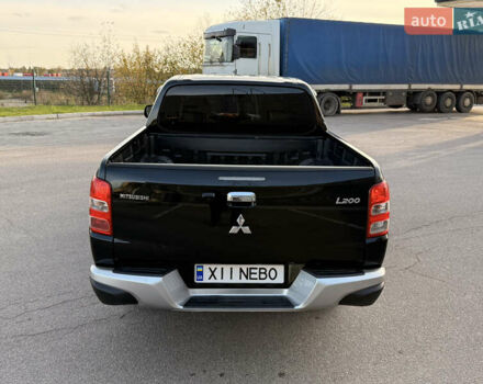 Чорний Міцубісі Л 200, об'ємом двигуна 2.44 л та пробігом 190 тис. км за 19900 $, фото 11 на Automoto.ua
