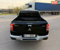 Чорний Міцубісі Л 200, об'ємом двигуна 2.44 л та пробігом 190 тис. км за 19900 $, фото 11 на Automoto.ua