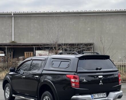 Черный Мицубиси Л 200, объемом двигателя 2.4 л и пробегом 186 тыс. км за 22200 $, фото 3 на Automoto.ua